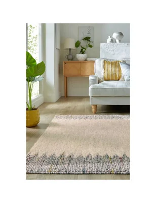 Dywan Wełniany Ramka Minerals Border Czarny/Kremowy – aranżacja w salonie